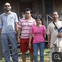 A part of village community together with us in front of the lodge.