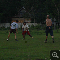 Soccer game in the evening.