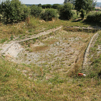 Construction pit with completed border.