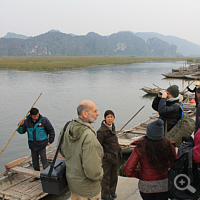 The boat pier. You see in the background the limestones, home of the Delacour's langurs.